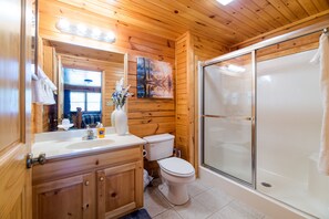 Shower, towels, soap, toilet paper