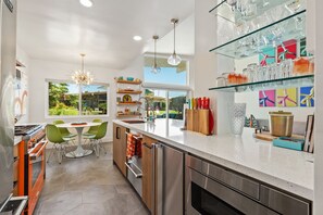 Coffee/tea maker, fridge, microwave, oven