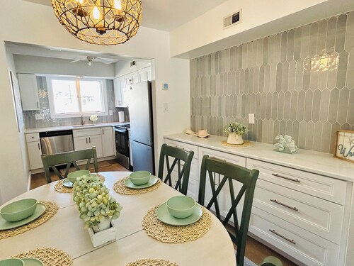 Stunning beach block 4BD/3.5BA North End home. 2Car Garage & 30sec walk to sand!