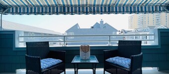 Stunning beach block 4BD/3.5BA North End home. 2Car Garage & 30sec walk to sand!