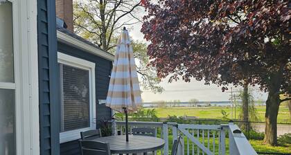 Sit by the fire with a beautiful lake view, pet friendly, close to the beach