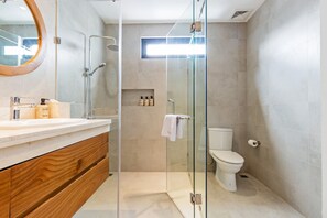 Bathtub, hair dryer, towels, soap