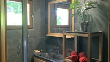 Shower, hair dryer, towels, soap