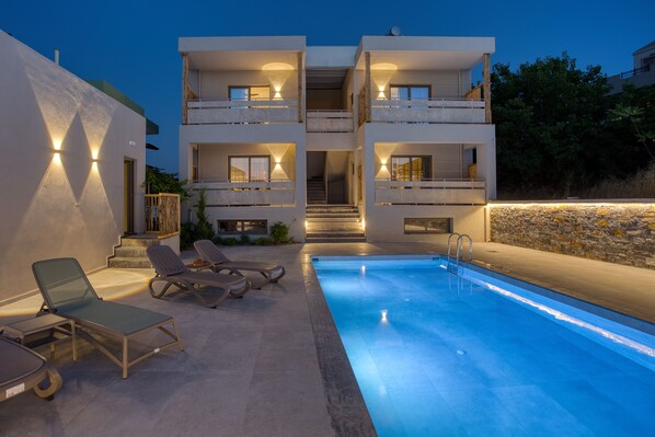 Seasonal outdoor pool, open 11:00 AM to 7:00 PM, sun loungers