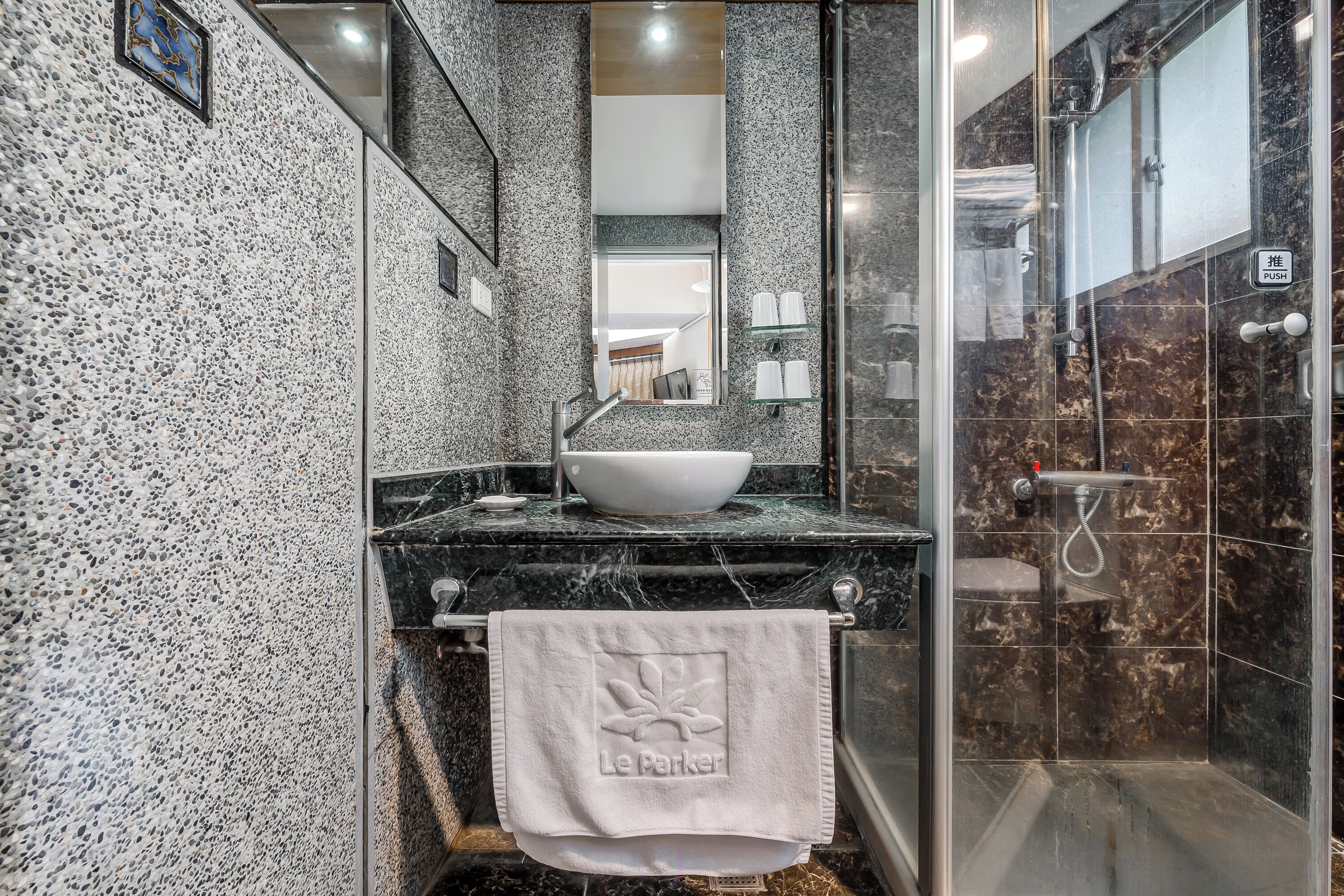 standard quadruple room | bathroom | shower, hair dryer, towels, shampoo