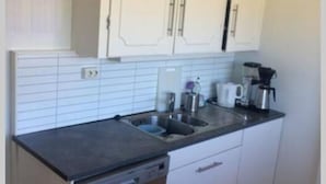 Appartement, 4 slaapkamers | Privékeuken | Een koelkast, een oven, een kookplaat, een vaatwasser