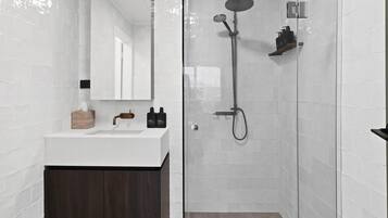 Shower, hair dryer, towels, soap