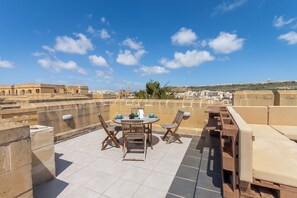 Family House, Multiple Bedrooms, 2 Bathrooms (Getaway Npetto Gozitan Villa) | Outdoor dining - Getaway Npetto Gozitan Villa (Ghajnsielem)