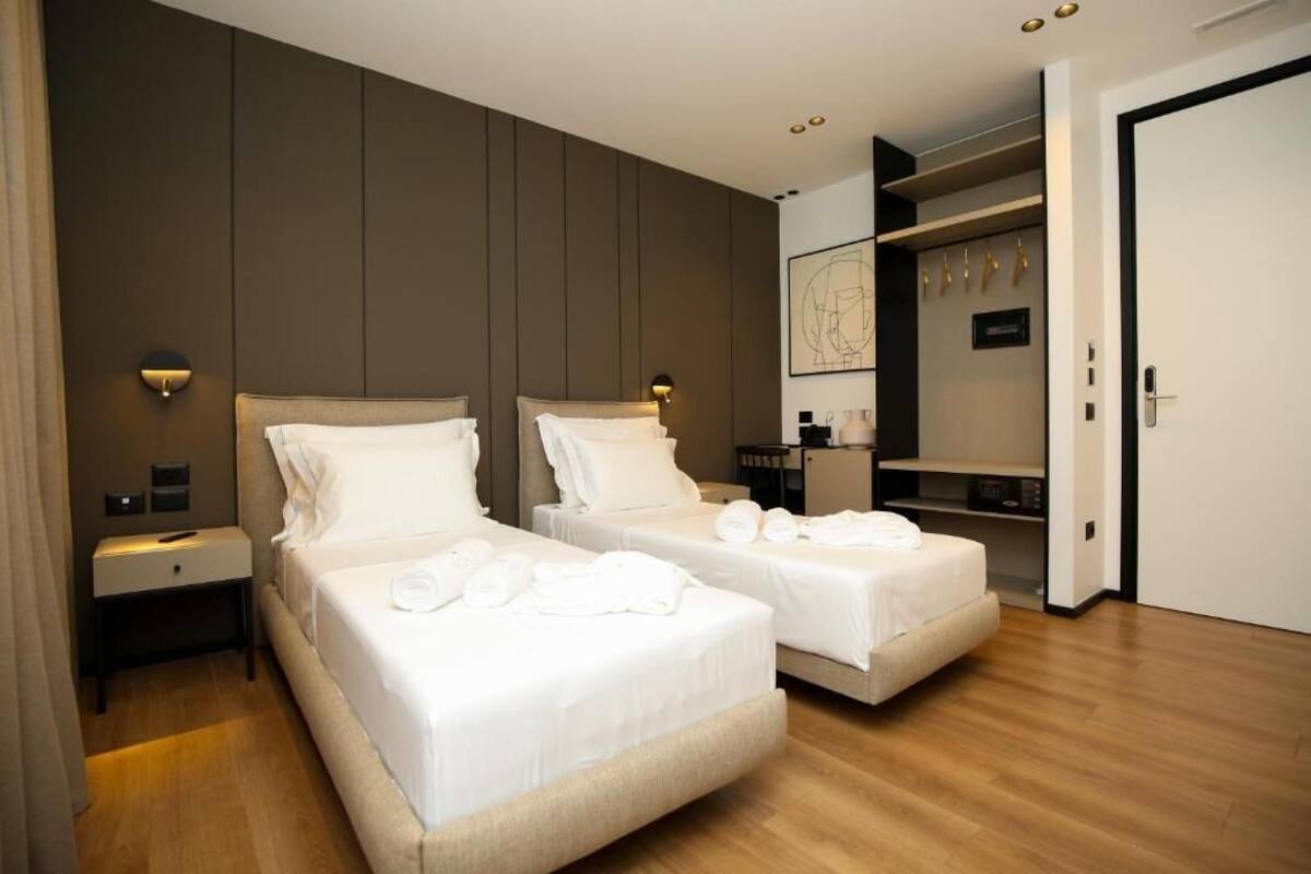 Double or Twin Room, Partial Sea View | Desk, WiFi (free), bed sheets