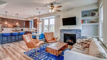 Smart TV, fireplace, books