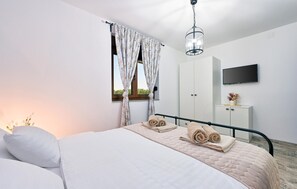 2 chambres, coffre-fort, lit de bébé portatif, accès au Wi-Fi (inclus)