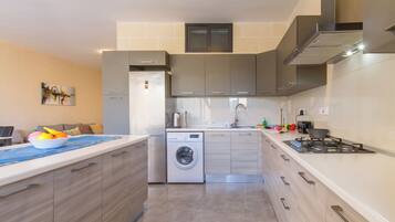Family House, Multiple Bedrooms (Ta'Siku Gozitan villa + Pool & hot) | Private kitchen | Fridge, microwave, oven, stovetop