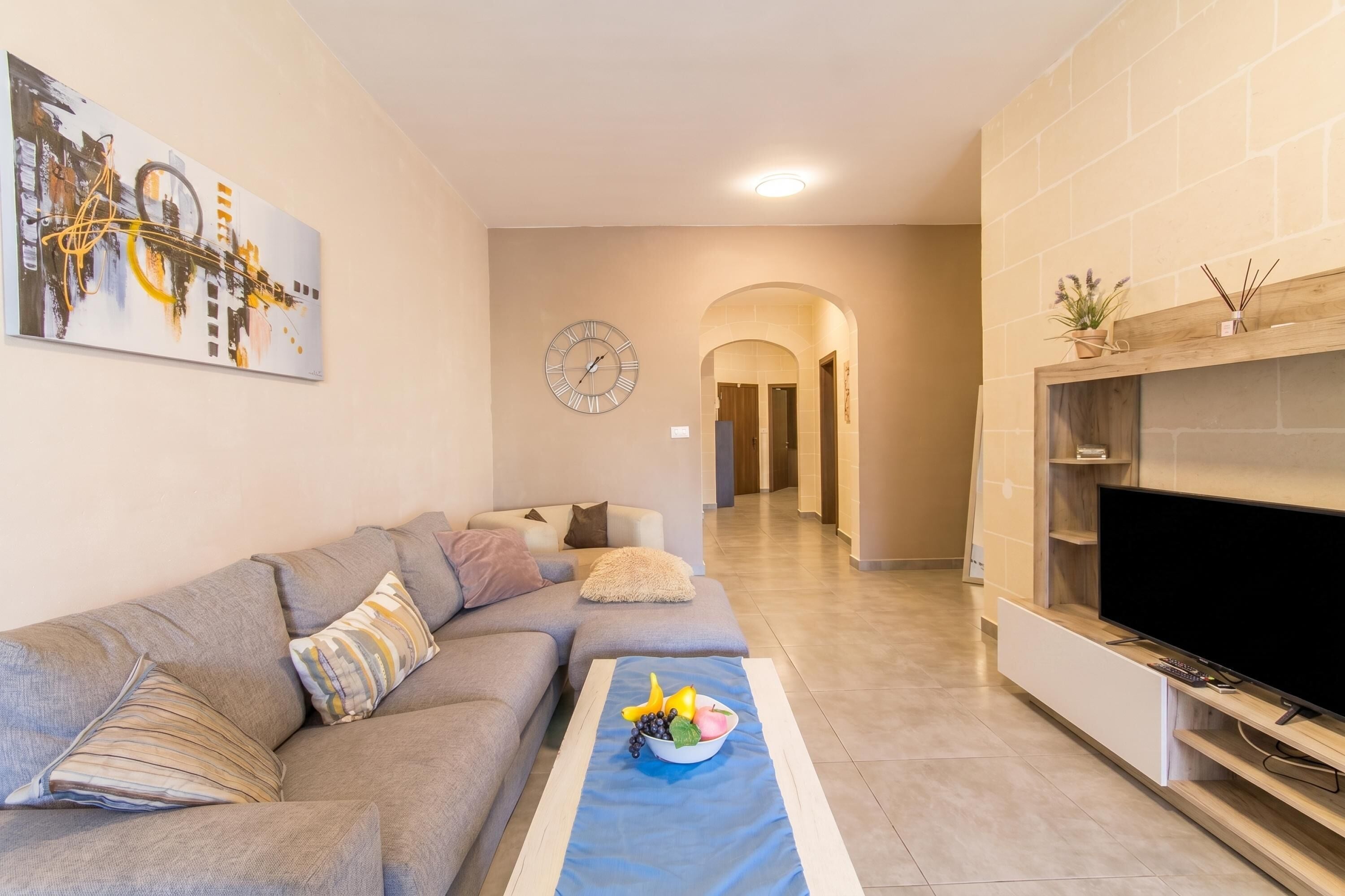 Family House, Multiple Bedrooms (Ta'Siku Gozitan villa + Pool & hot) | Living area | 21-inch TV with cable channels