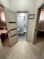 Family Quadruple Room | Premium bedding, desk, blackout drapes, iron/ironing board