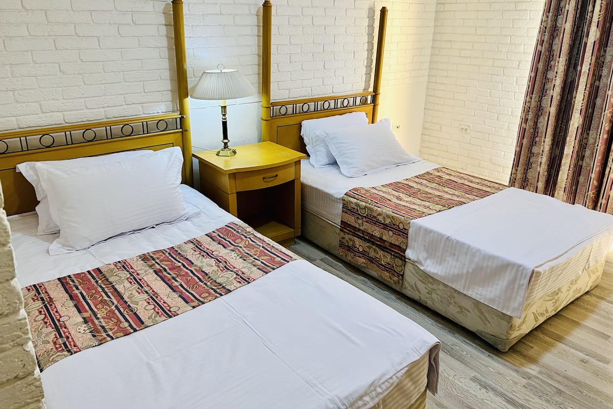Quarto standard | 1 quarto, cofres nos quartos, ferros/tábuas de passar roupa