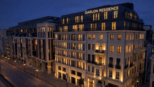 A multi-story hotel with a prominent 'GARLON RESIDENCE' sign, featuring a classic architectural style with uniform windows and balconies. - Garlon Residence (Istanbul)