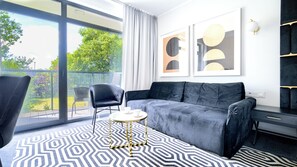 Studio (A 120 - z klimatyzacją) | Living area | Flat-screen TV - Apartamenty Sun & Snow Solny Resort (Kolobrzeg)