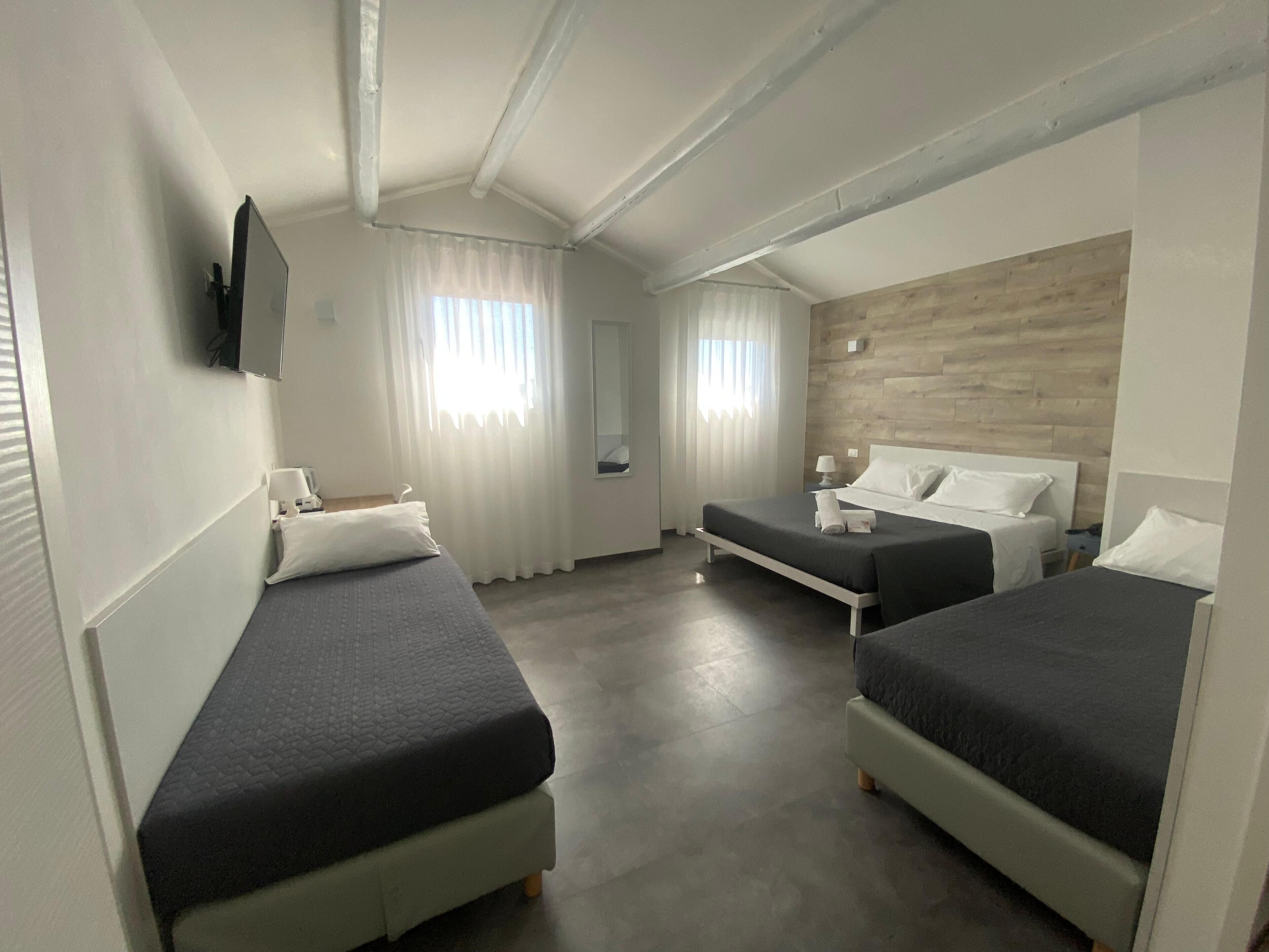 Phòng 4 dành cho gia đình | Minibar, bàn, truy cập Internet không dây miễn phí, bộ trải giường 