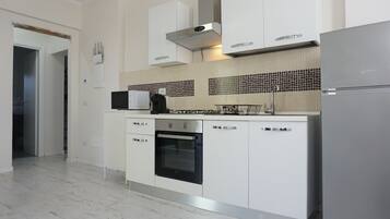 Frigorifero, microonde, forno, macchina per tè/caffè