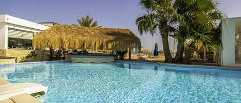 Outdoor pool, pool umbrellas, pool loungers