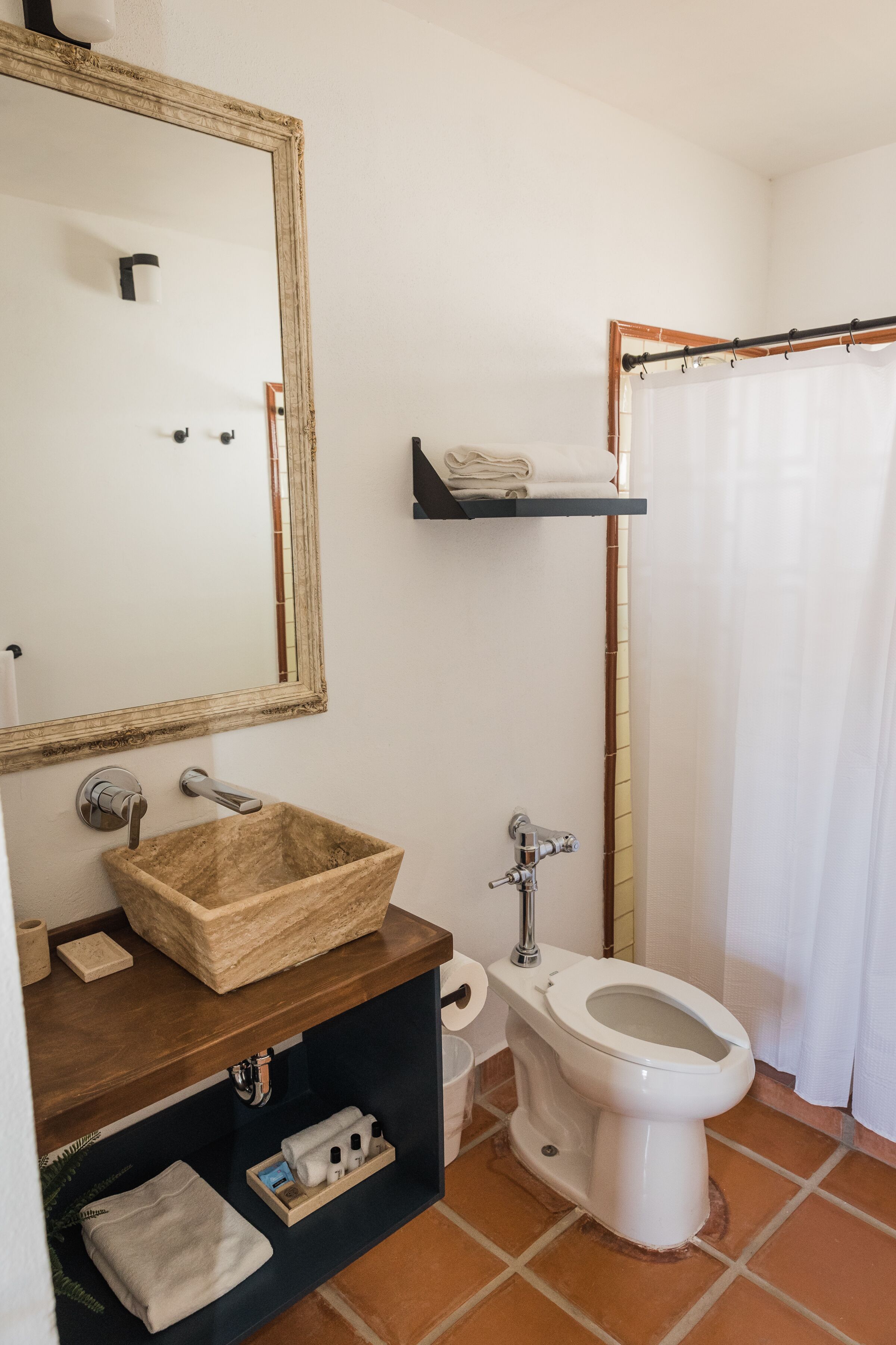 junior suite | bathroom | shower, hair dryer, towels, soap