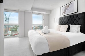 2 habitaciones, tabla de planchar con plancha y cuna de viaje 