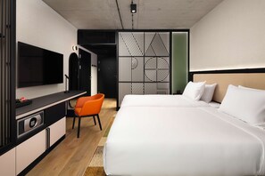 Premium bedding, down duvets, in-room safe, desk