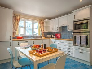 Dishwasher, high chair, cookware/dishes/utensils - 4 bedroom accommodation in Little Haven (Little Haven)