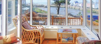 Delightful seaside holiday home with panoramic views across Aberaeron harbour.