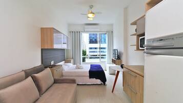 Apartamento ejecutivo | 1 dormitorio, cuna de viaje, wifi gratis y ropa de cama