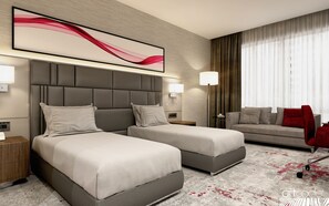 A hotel room with two beds, a sofa, a red chair, and a large abstract painting on the wall. - Ramada by Wyndham Rize Findikli (Findikli)