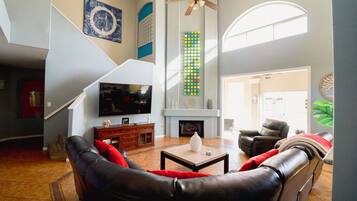 Smart TV, fireplace, books