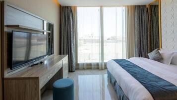 Minibar, blackout curtains, soundproofing