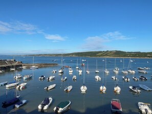 Marina - Y Tŷ Glas is a charming terraced cottage in New Quay. (New Quay)