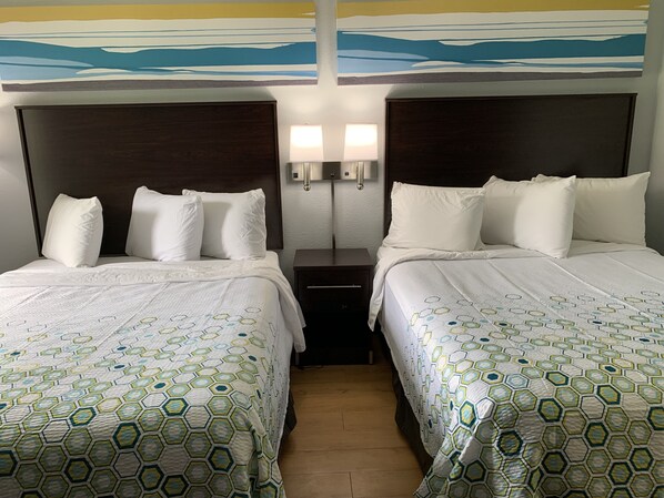 Studio, 2 Queen Beds, Non Smoking | Desk, laptop workspace, soundproofing, iron/ironing board - HomeTowne Studios by Red Roof Battle Creek (Battle Creek)