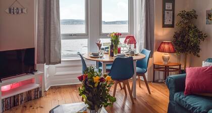 A spacious apartment with stunning views over Gare Loch.
