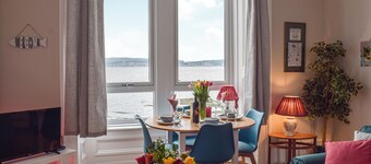 A spacious apartment with stunning views over Gare Loch.