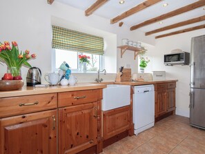 Private kitchen - A dog-friendly ‘Haven Secret Waterway’ holiday cottage in Llangwm near Burton. (Llangwm, near Burton)