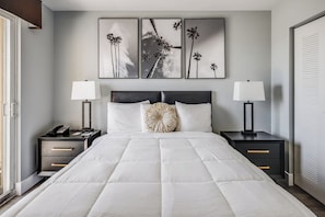 Premium bedding, down duvets, memory-foam beds, laptop workspace