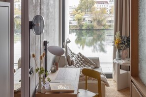 City Studio, River View | Living area | 42-inch Smart TV with digital channels, TV - Locke at East Side Gallery (Berlin)