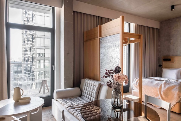 City Suite, City View | In-room safe, desk, laptop workspace, blackout drapes