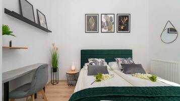 1 chambre, fer et planche à repasser, Wi-Fi, literie fournie