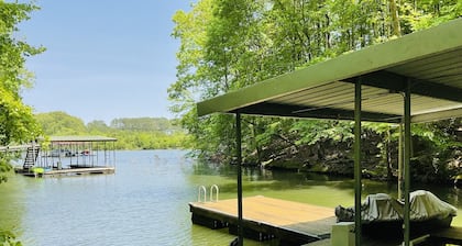 Family friendly lake front home with private dock in a cove