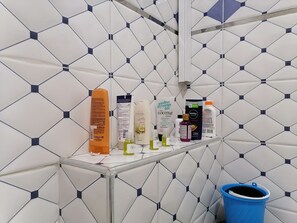 Shower, soap, shampoo, toilet paper