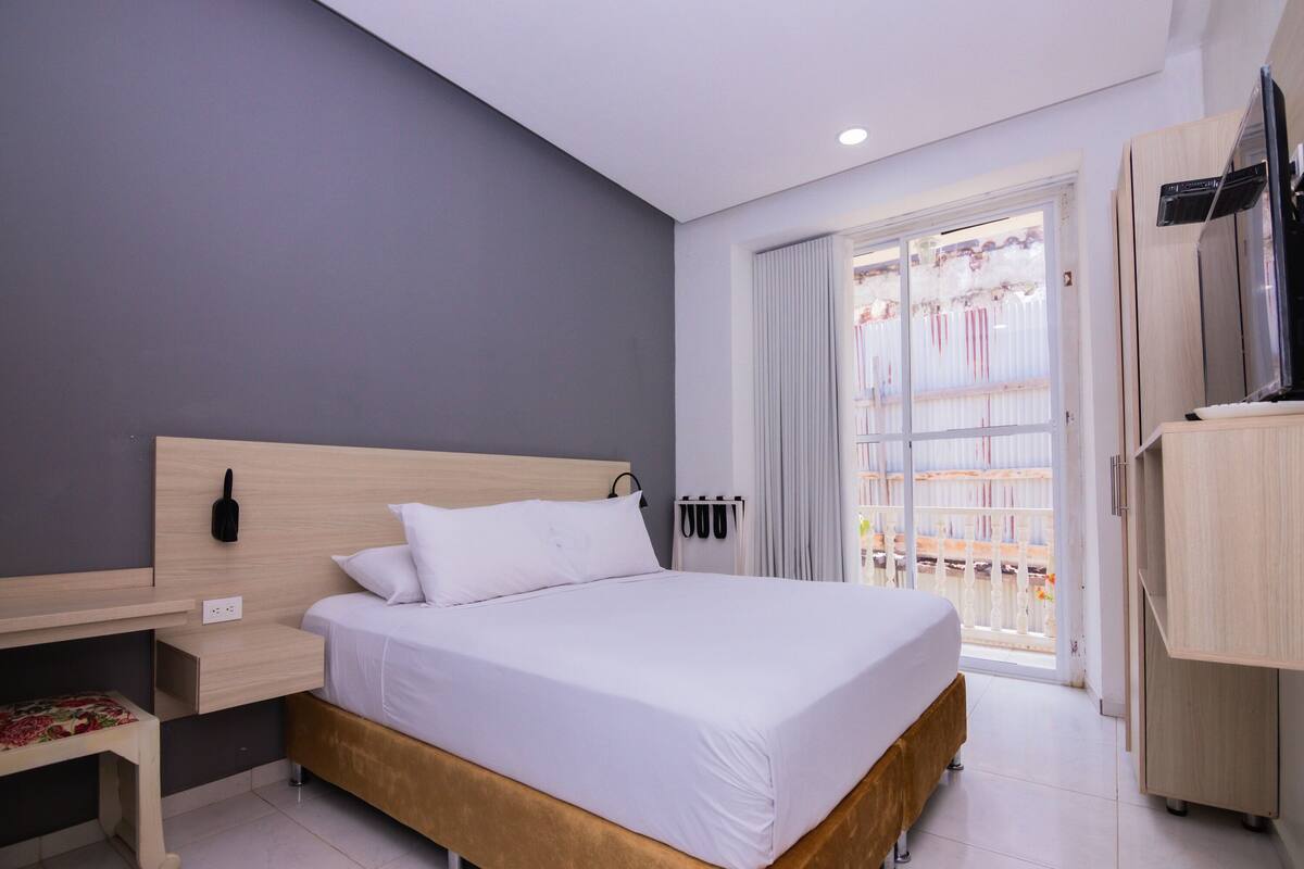 Habitación empresarial doble | Wifi gratis y ropa de cama