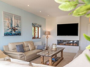 TV, fireplace - 4 bedroom accommodation in Tenby (Tenby)