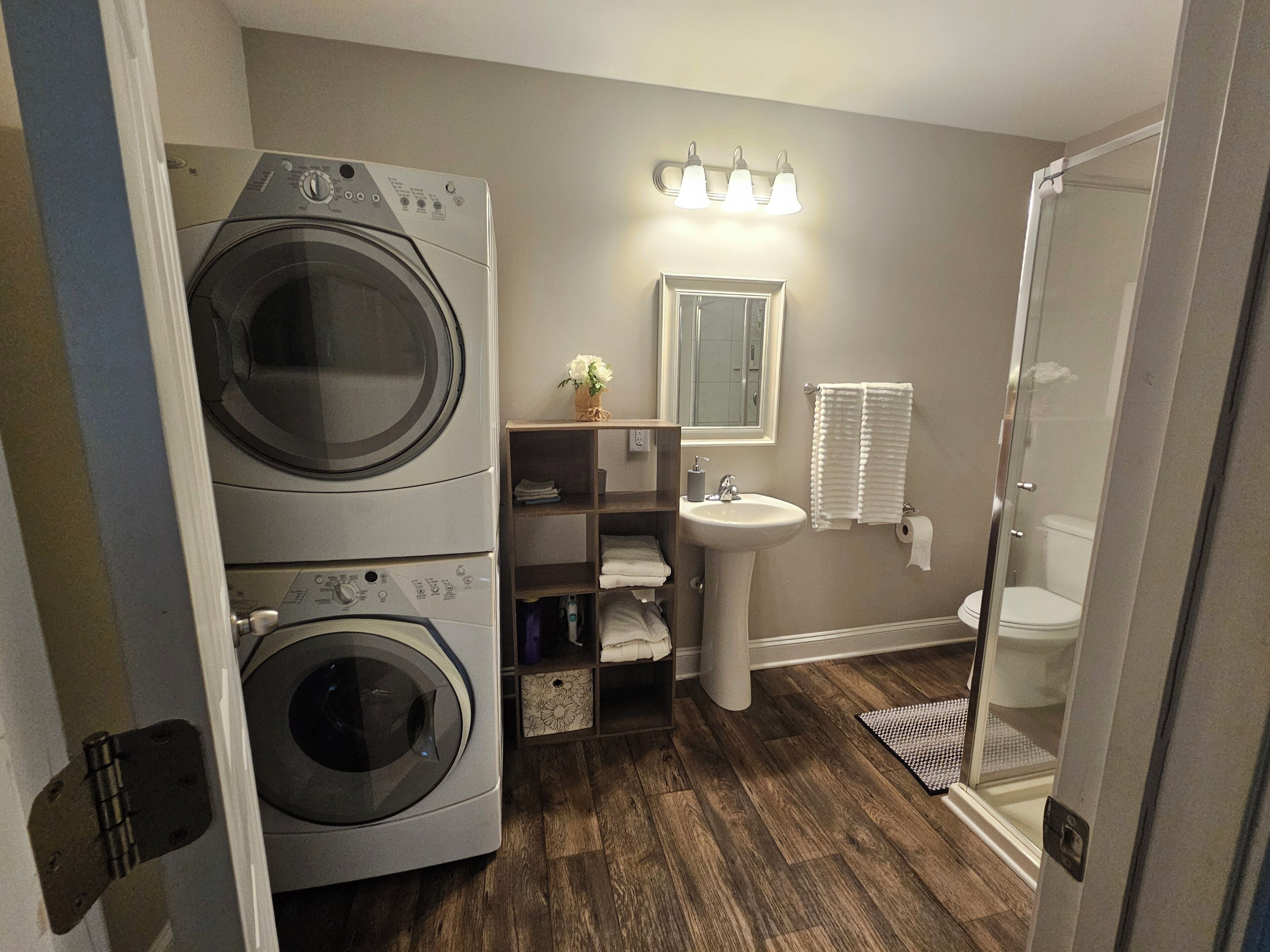 Combined shower/tub, hair dryer, towels, soap