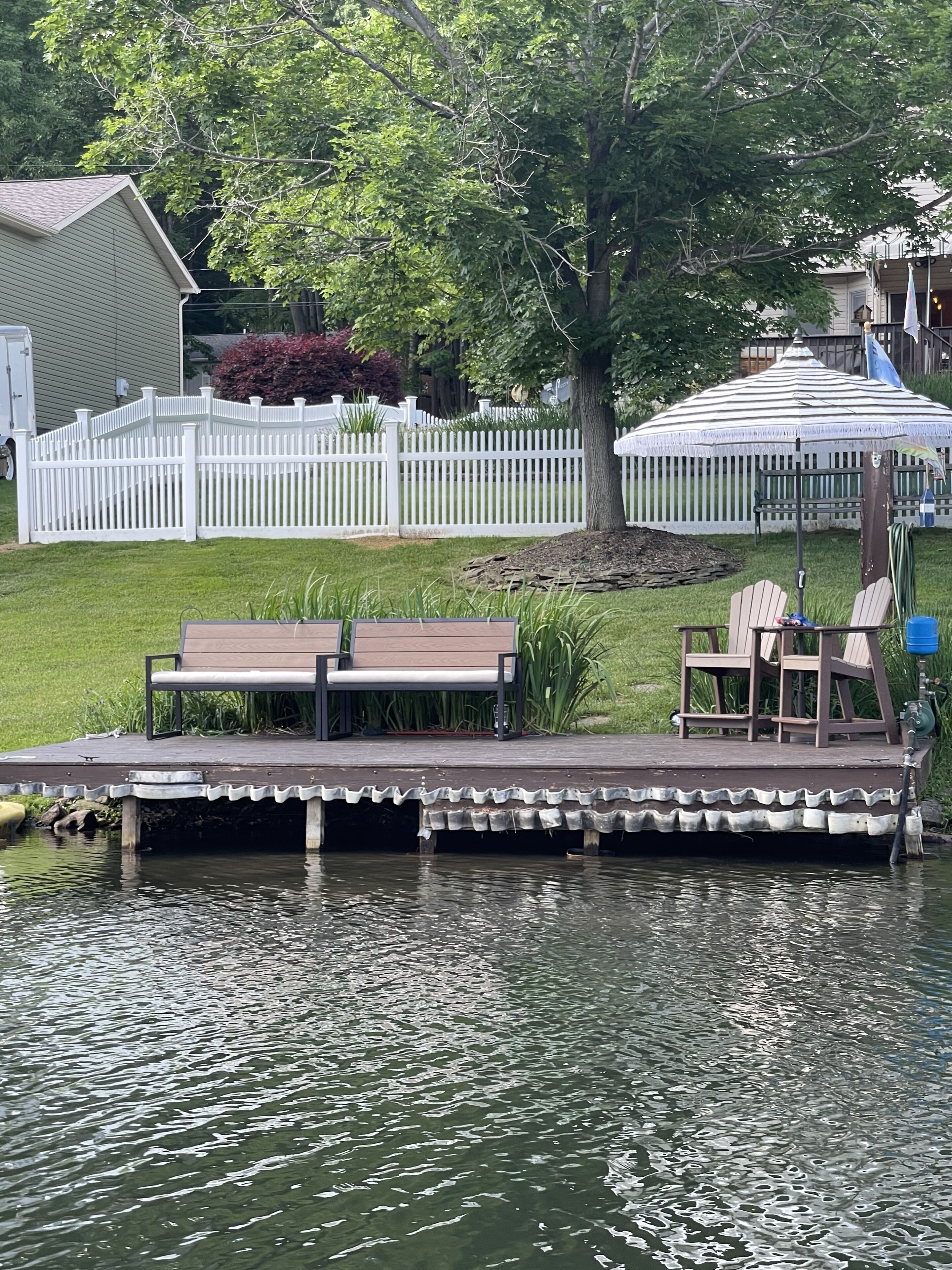 Waterfront with dock on friendly private lake.