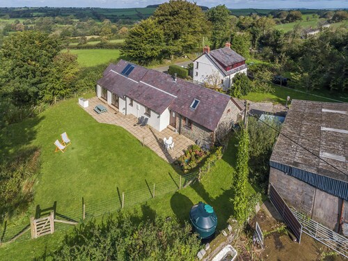 Spacious Teifi Valley barn for holidays near the Cardigan coast.