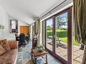 Fireplace - Spacious Teifi Valley barn for holidays near the Cardigan coast. (Cenarth)